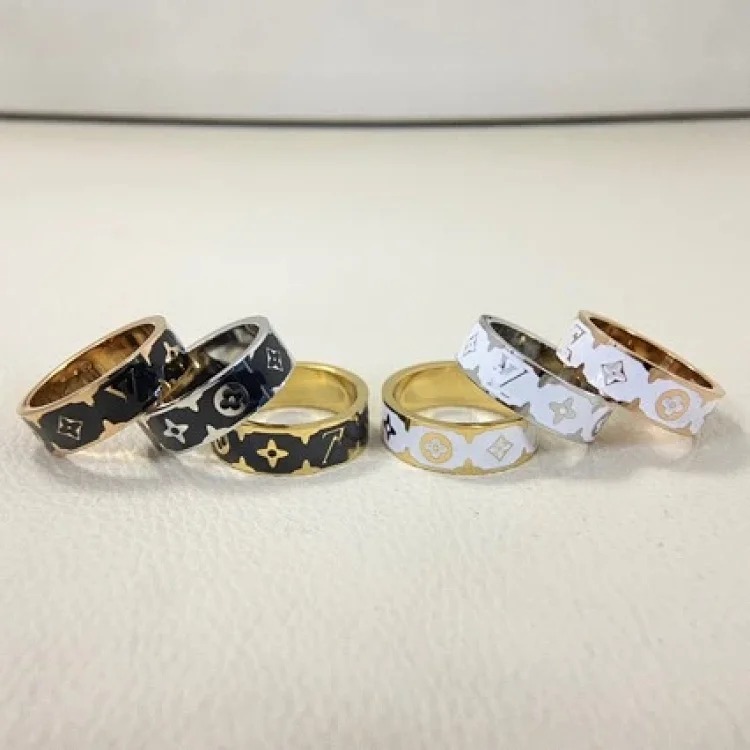 New letter pattern enamel ring, simple, fashionable and niche design, versatile titanium steel ring pair