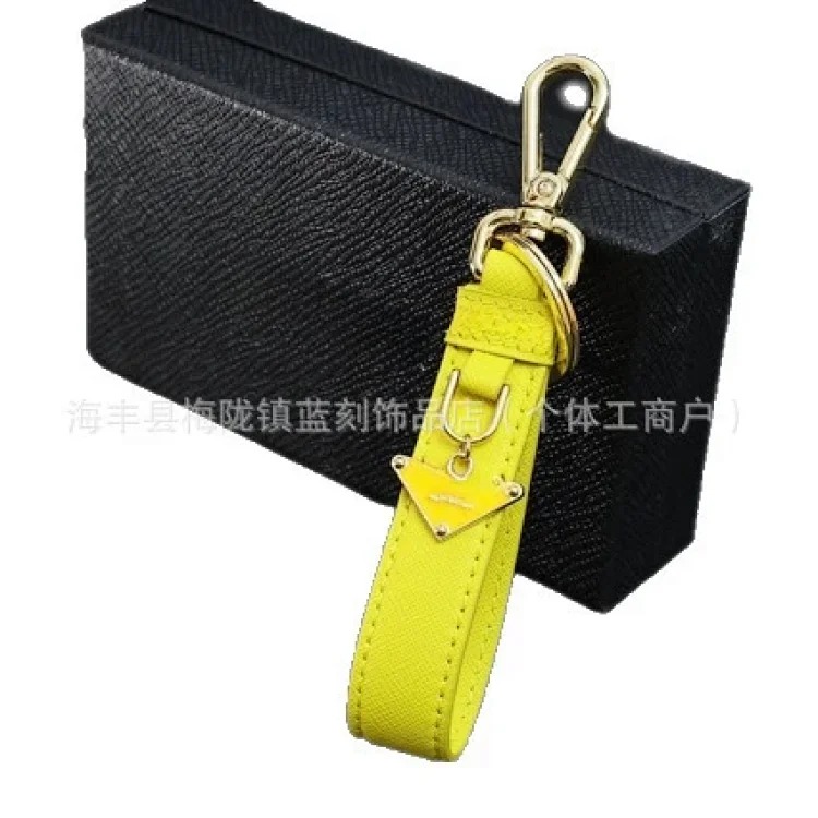 Pujia's new triangle logo keychain light luxury leather multi-color metal simple home pendant dropshipping image 2