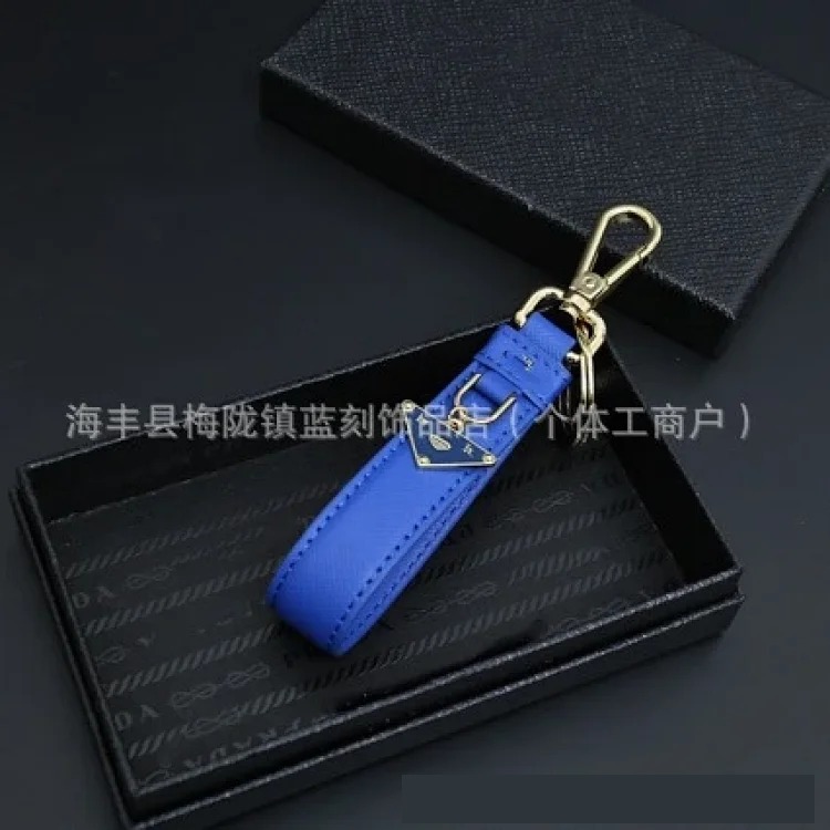 Pujia's new triangle logo keychain light luxury leather multi-color metal simple home pendant dropshipping image 4