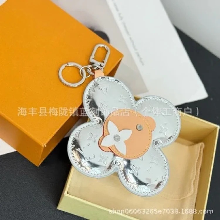Colorful sunflower keychain wear-resistant leather bag pendant jewelry leather doll Vivian doll ins image 3